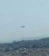 Picture showing Helicopter Gunship attacking Baloch Village