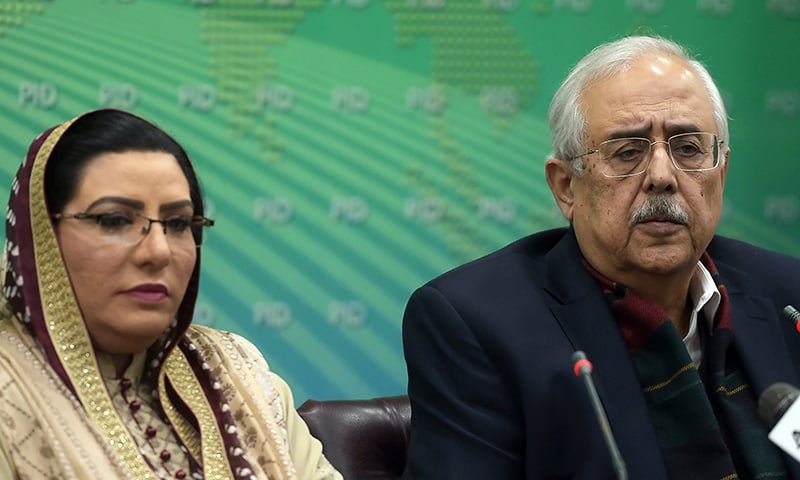 Pakistan's Attorney-General Anwar Mansoor Khan (R) speaks during a press conference along with Special Assistant to the Prime Minister for Information and Broadcasting, Firdous Ashiq Awan following a special court verdict against Ex-Army Chief General Pervez Musharraf , in Islamabad on December 17, 2019.