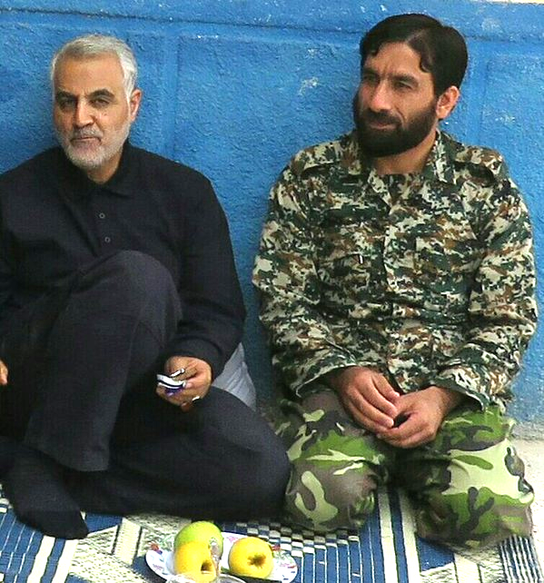 Soleimani’s Curse: Soleimani with Iranian commander Ezatollah Soleimani, killed in Syria on November 2, 2015
