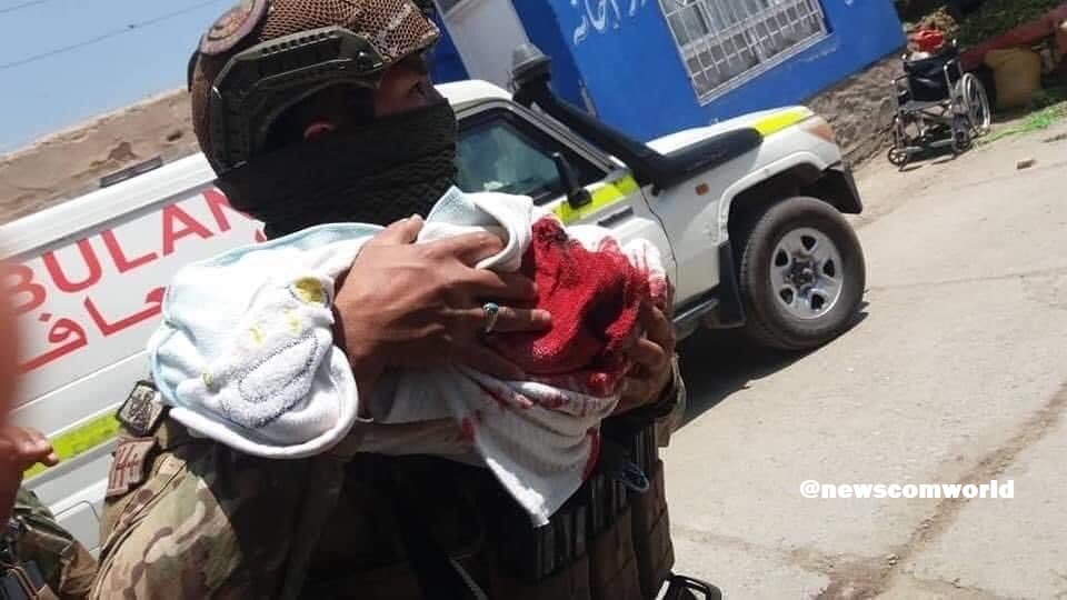 President Ghani Orders Offensive against Pakistan Supported Taliban Terrorists: A Security officer rescuing an injured new born baby from the Maternity hospital