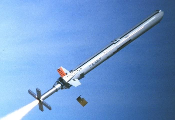 A test launch of an Affordable Weapon System loitering missile prototype. The weapon's large wing is visible along the top. After launch, this wing would turn 180 degrees into a deployed configuration.