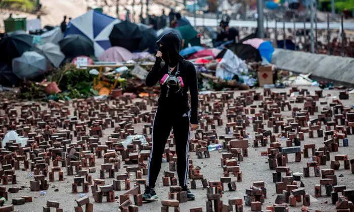 China in Focus - Hong Kong Protesters erect barricades with Bricks at the protest sites