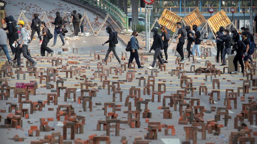 China in Focus - Hong Kong Protesters erect barricades with Bricks at the protest sites