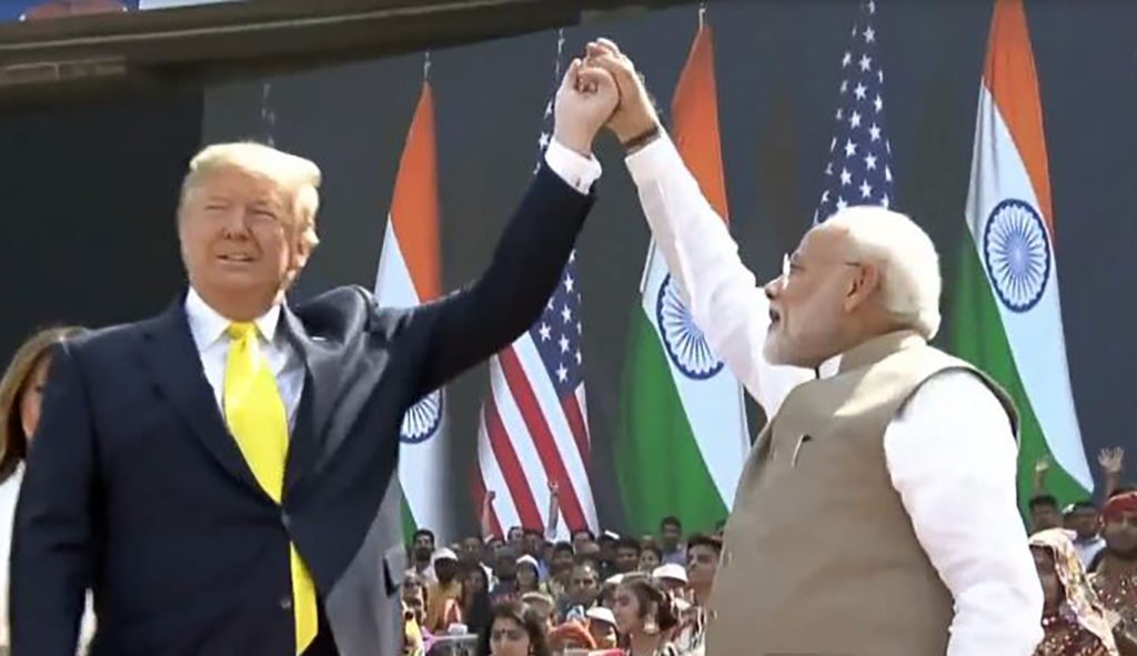 China's Strategic Myopia - By Lt Gen PR Shankar (Retd): US President Donald Trump and Indian Prime Minister Narendra Modi holding hands at a rally in India during President Trump Visit