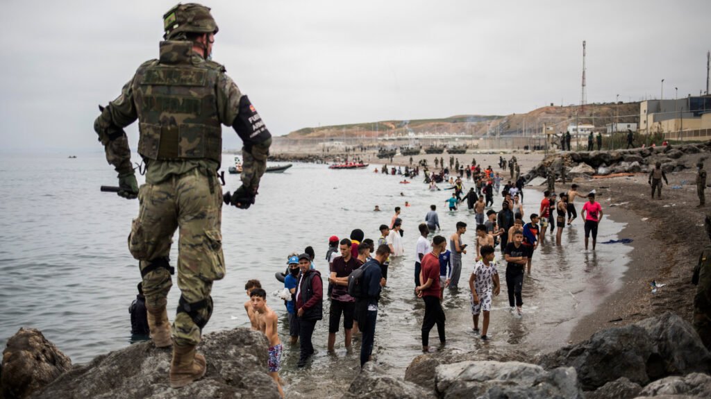 Spain Deployed troops as Islamic Nation Morocco Sends 8000 Illegal Migrants into Spain's Ceuta Enclave as "Consequences" | NewsComWorld.com